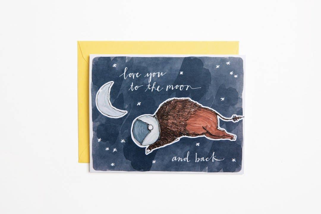 Whimsical greeting card with bison in space helmet, stars, moon, and 'love you to the moon and back' text