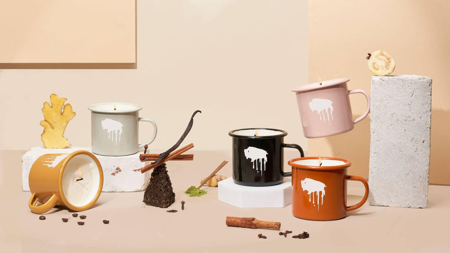 Enamel mugs with buffalo design, styled with spices and candles for rustic home decor