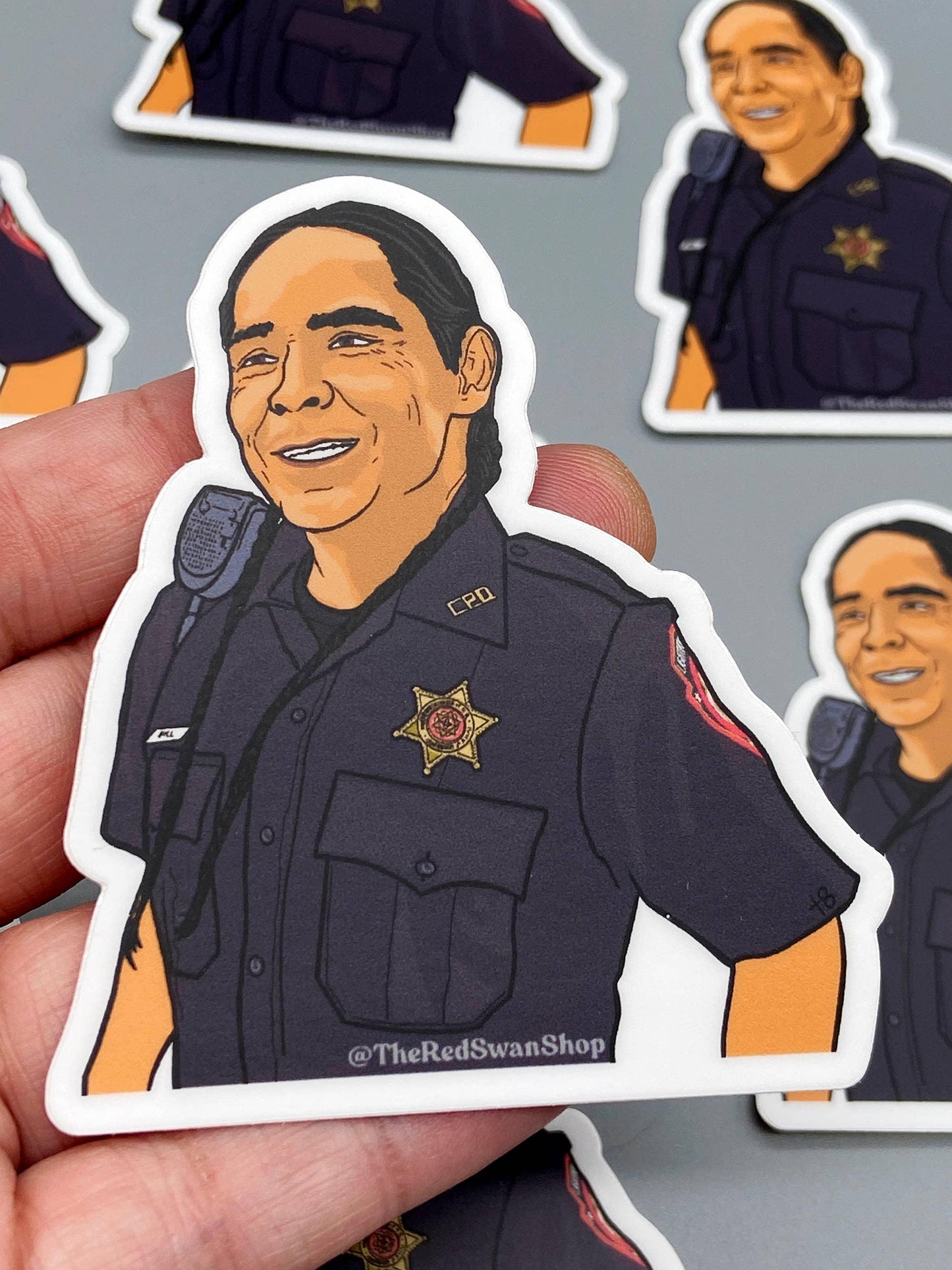 Police officer sticker with badge and radio, Native art style, @TheRedSwanShop