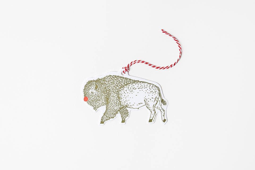 Bison ornament with red and white string, Native American art craft supply