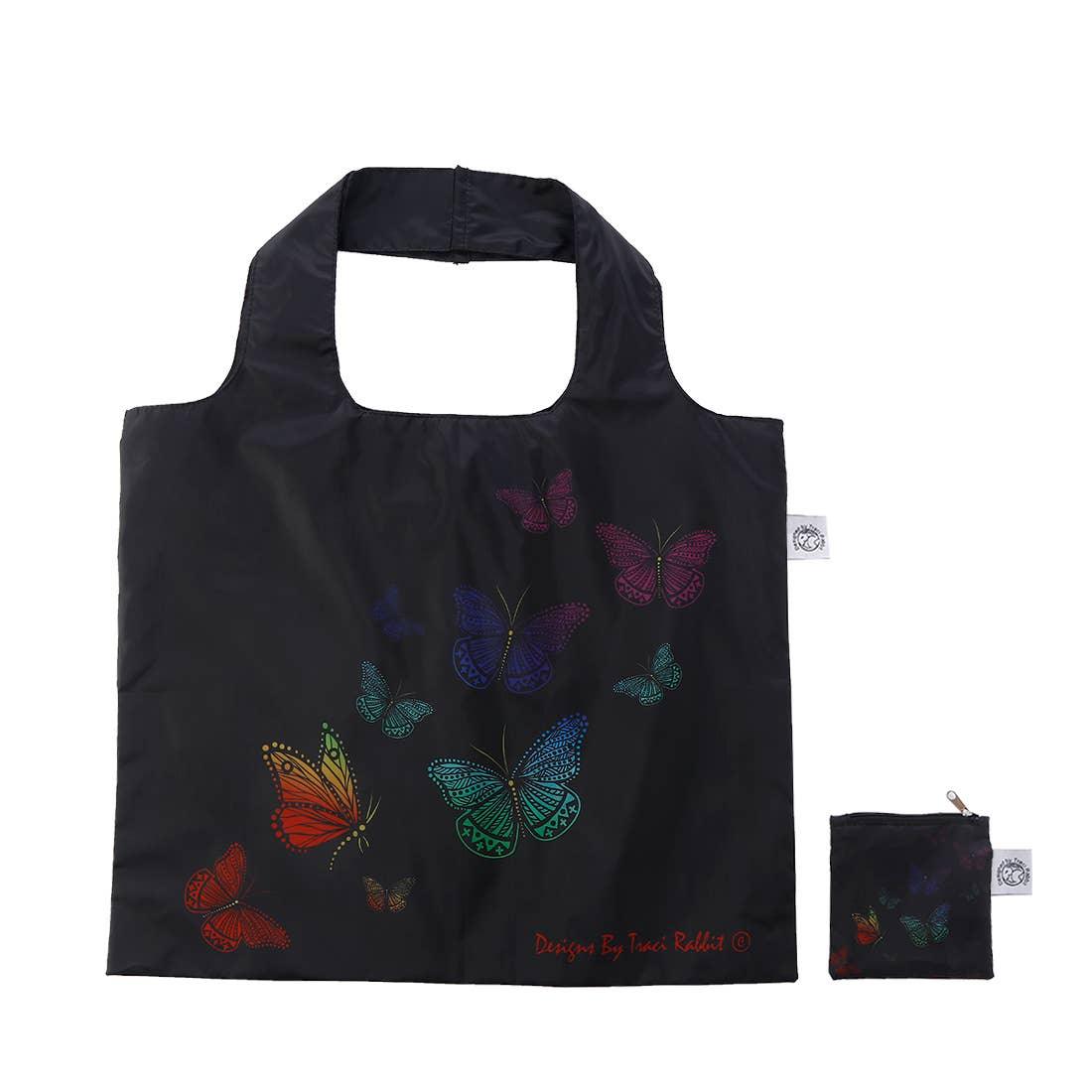 Black reusable tote bag with colorful butterfly print, compact foldable design for shopping or crafts