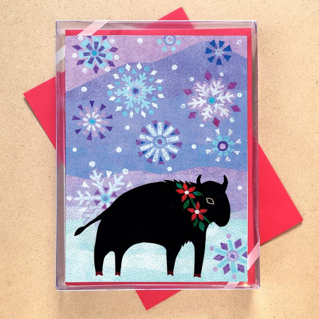 Winter holiday card with bison silhouette, snowflakes, and poinsettia wreath, perfect for Native art lovers