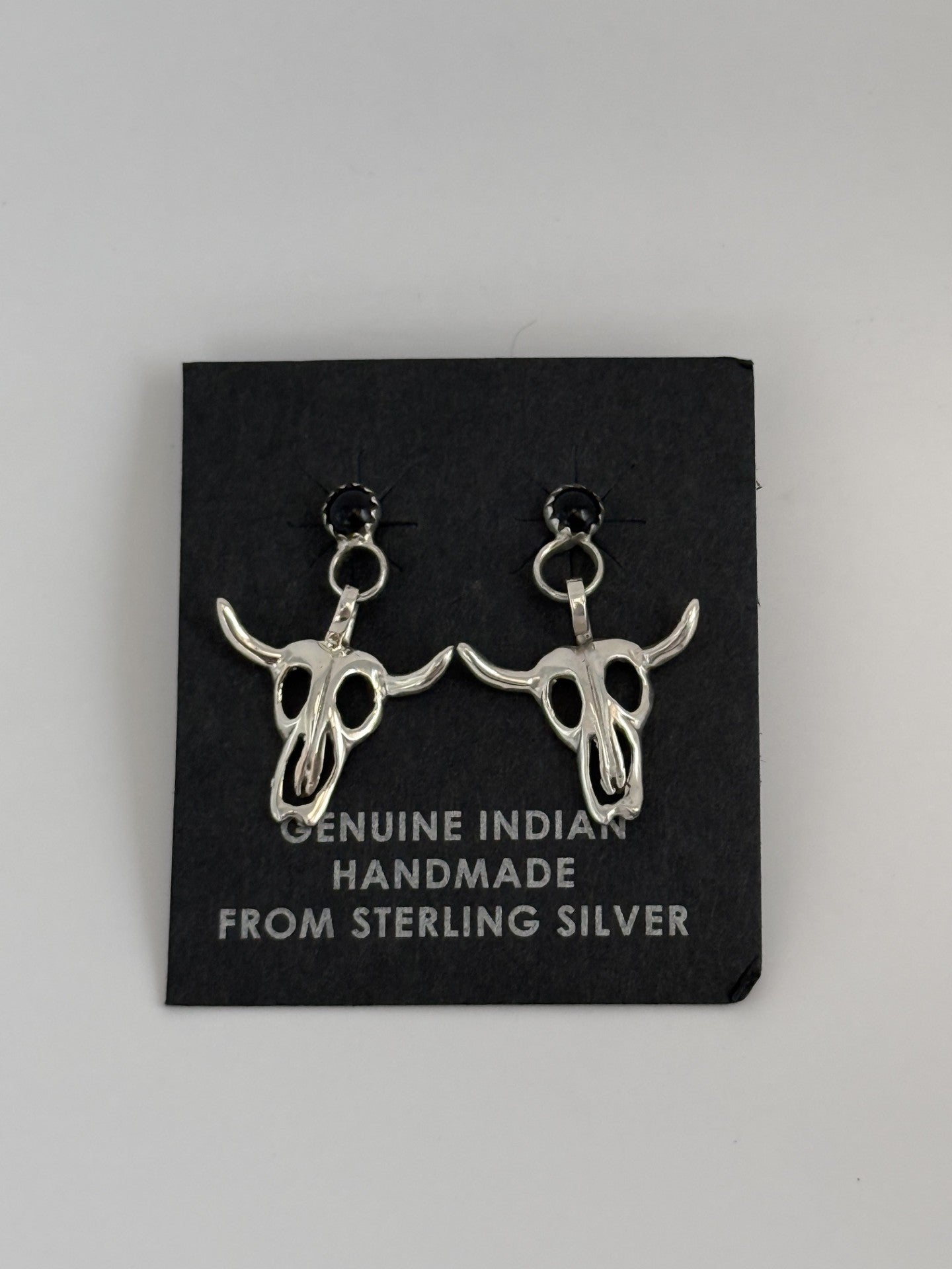 Sterling Silver Skull Earrings with Black Onyx