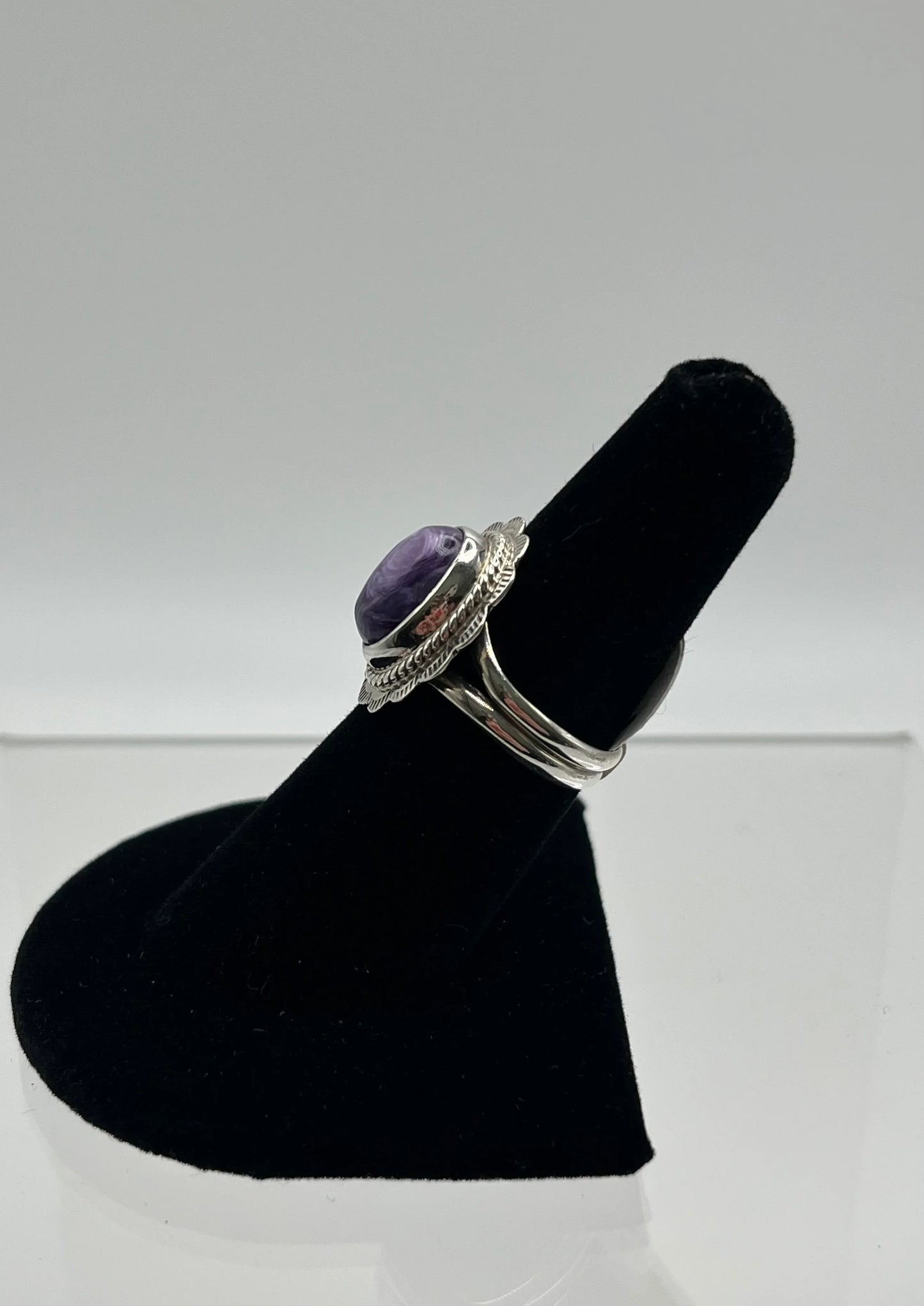 Purple stone Native American style silver ring on black display stand