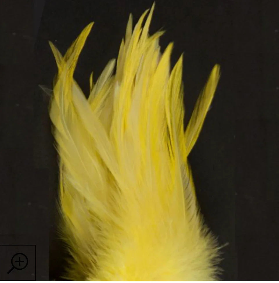 Bright yellow craft feathers for Native American art and traditional clothing projects