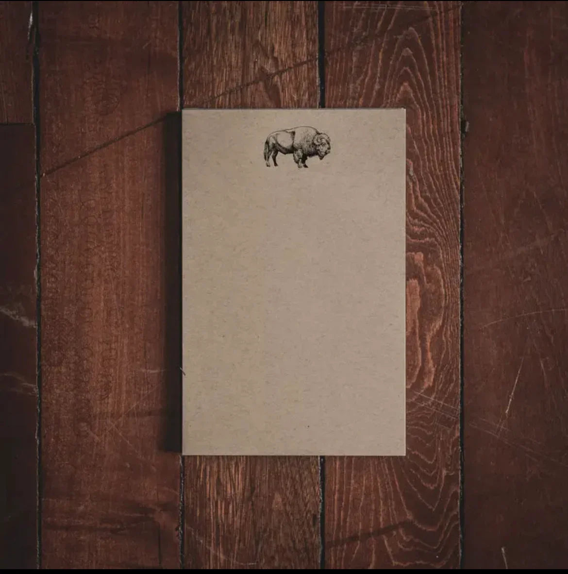 Buffalo sketch notepad on rustic wood, ideal for Native art and craft journaling