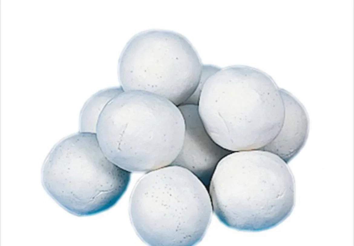 White clay balls for Native American art and craft projects, ideal for traditional pottery and handmade crafts.