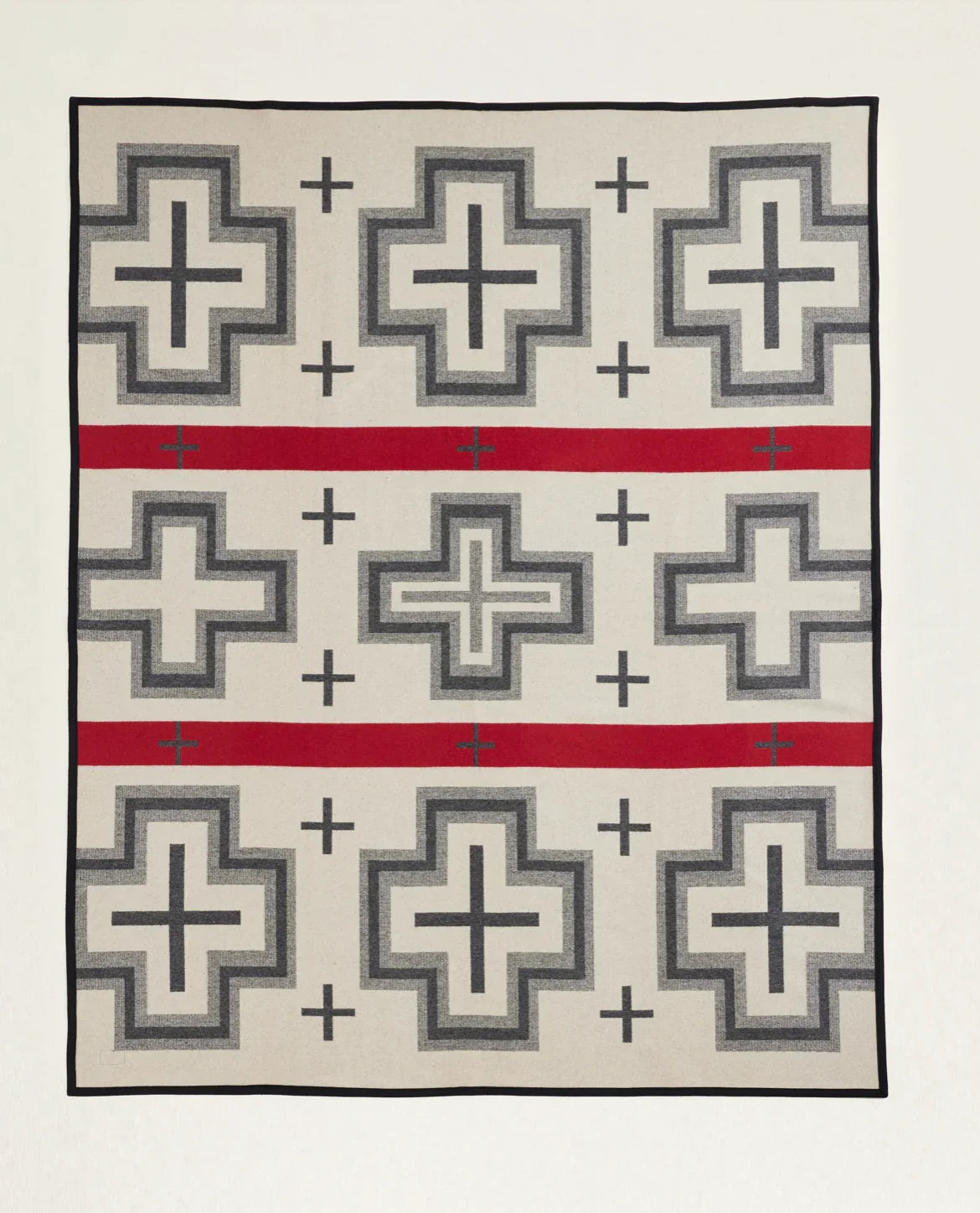 Native American geometric patterned blanket with cross motifs and red stripes, traditional craft textile