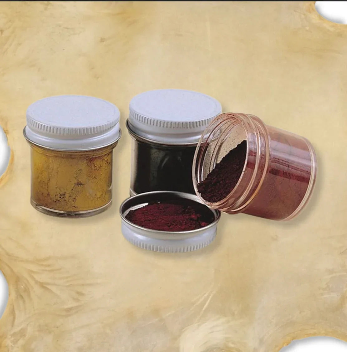 Native art pigment powders in jars for traditional crafts and clothing dyeing