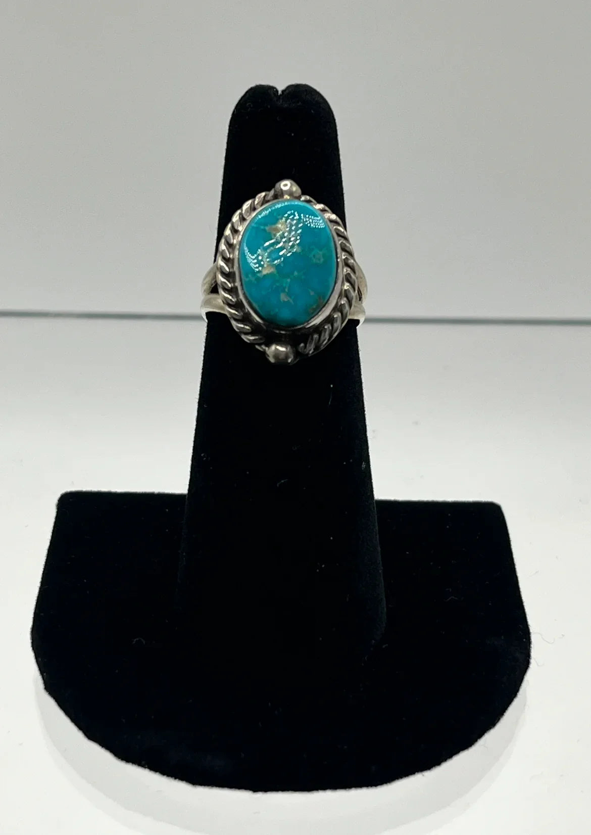 Turquoise and Sterling Silver Ring with Twist Edge Detail; Size 6.75