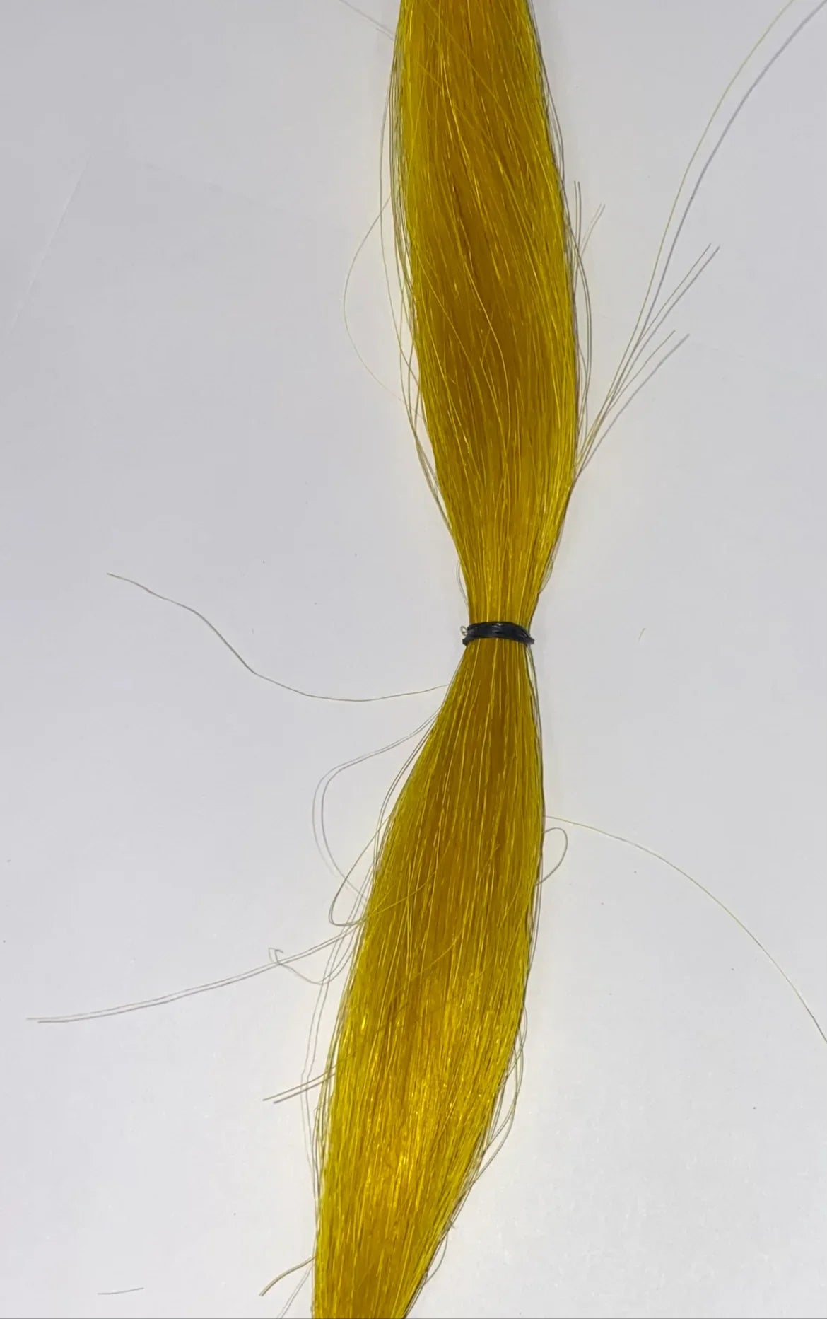 Golden yellow synthetic hair bundle for Native American craft and traditional regalia making
