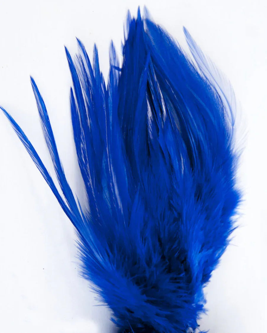 Vibrant blue craft feathers for Native American art and traditional clothing projects