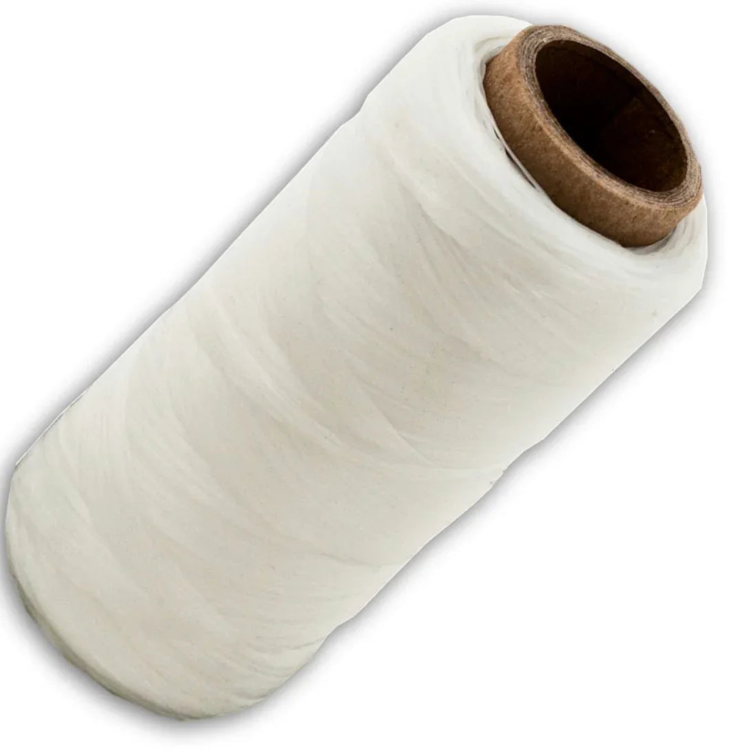 White cotton thread spool for Native American crafts and traditional clothing