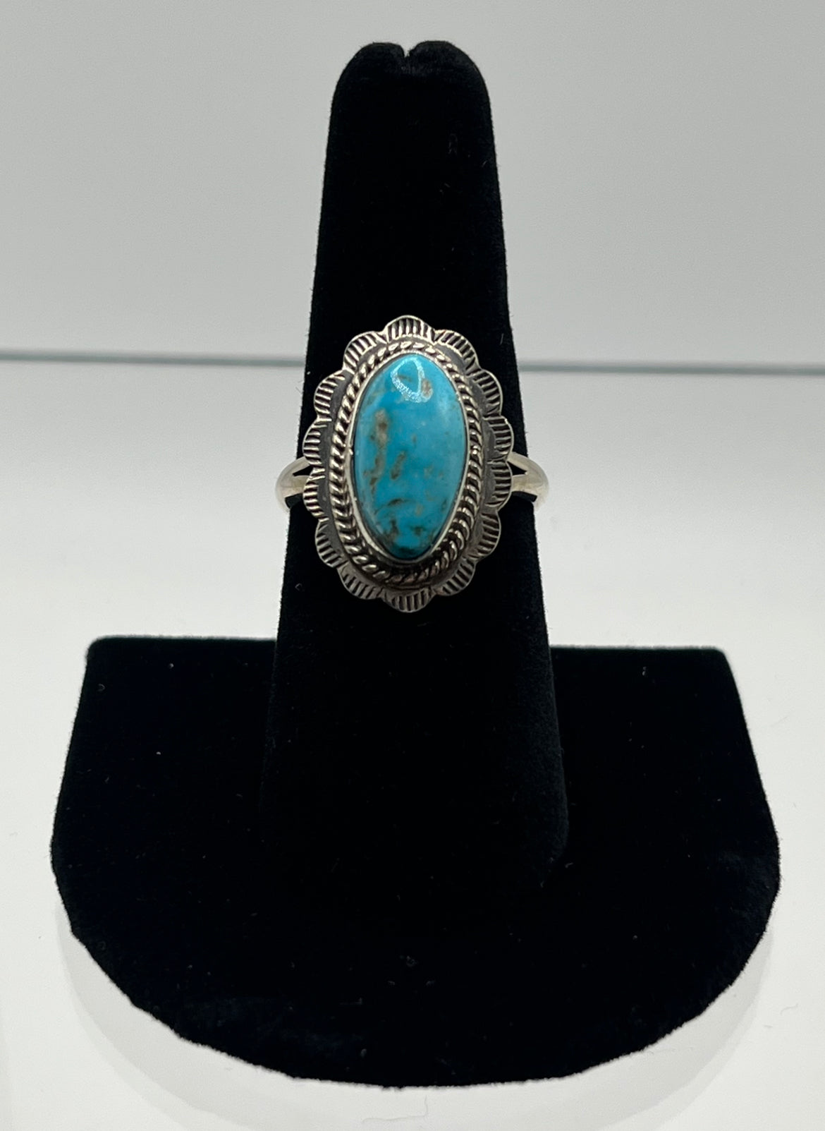 Kingman Turquoise and Sterling Silver Oval Shaped Ring with Floral Detail; Size 8.75