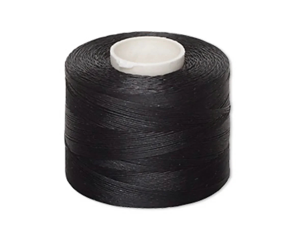 Black thread spool for Native American beadwork and traditional craft sewing