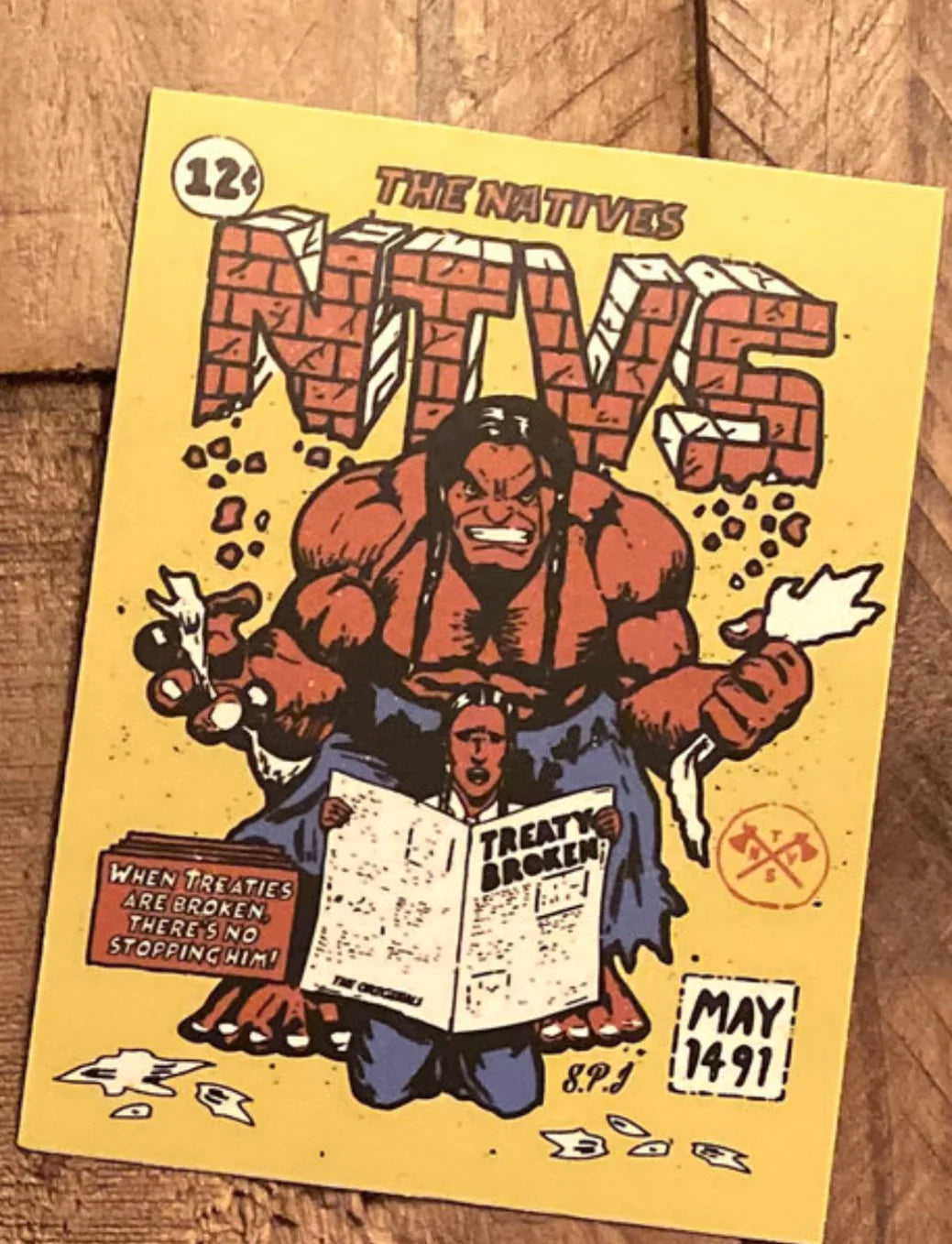 The Natives NTVS comic zine with bold brick lettering, muscular figure, and 'Treaty Broken' headline on yellow cover