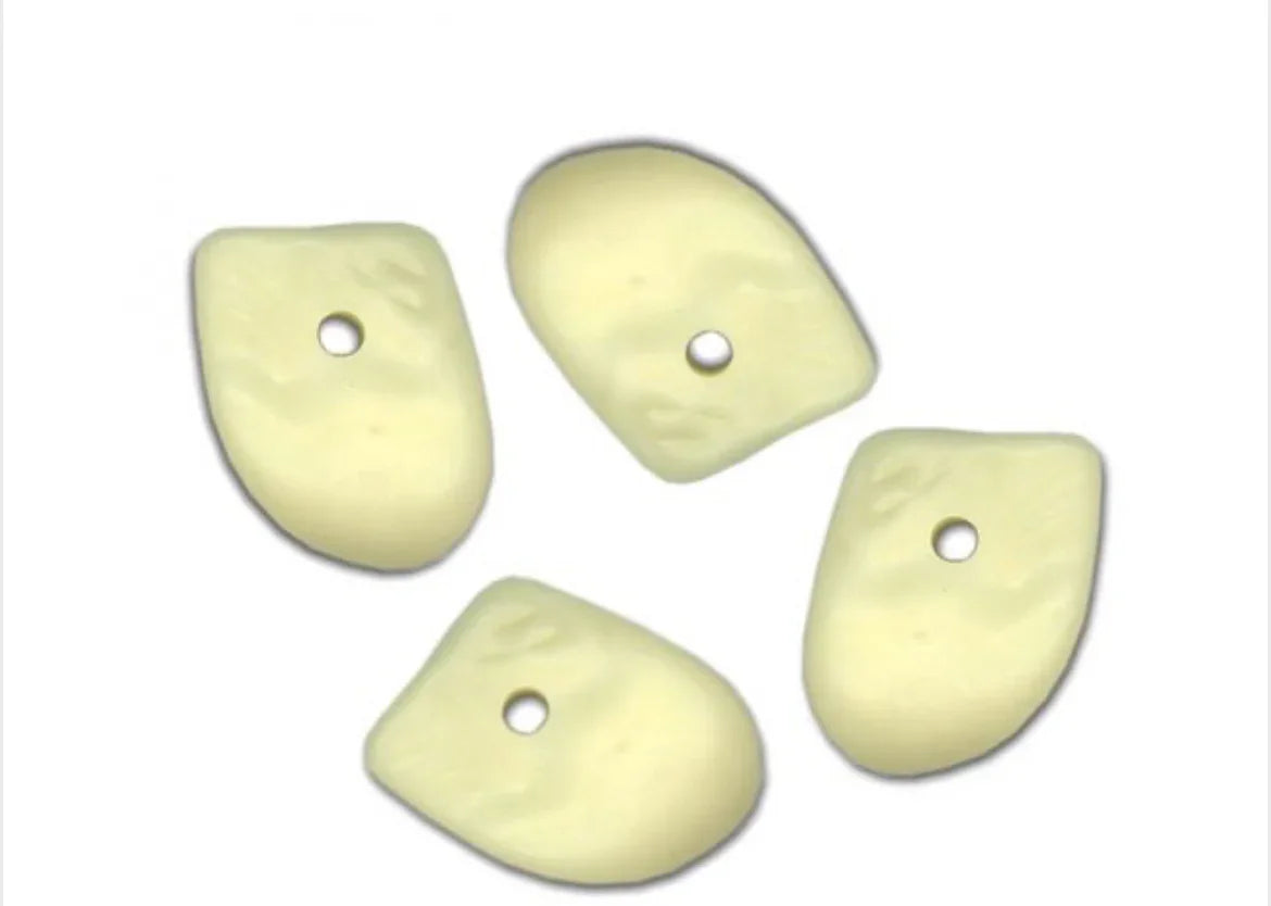 Ivory-colored Native American craft beads with hole for stringing, ideal for traditional jewelry making