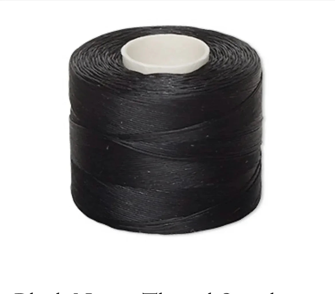 Black nylon thread spool for Native American beadwork and craft projects