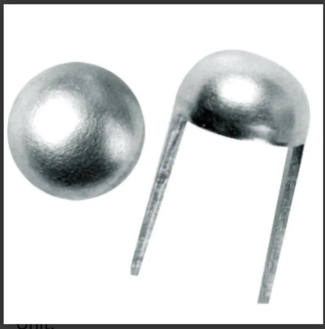 Silver metal bead caps for Native American jewelry crafting, featuring dome shape and pronged base