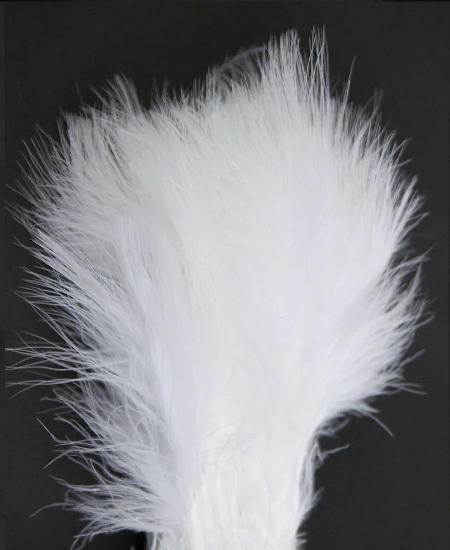 White fluffy feather for Native American crafts and traditional clothing