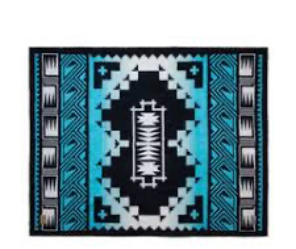Native American style blanket with black, turquoise, and white geometric patterns for traditional crafts