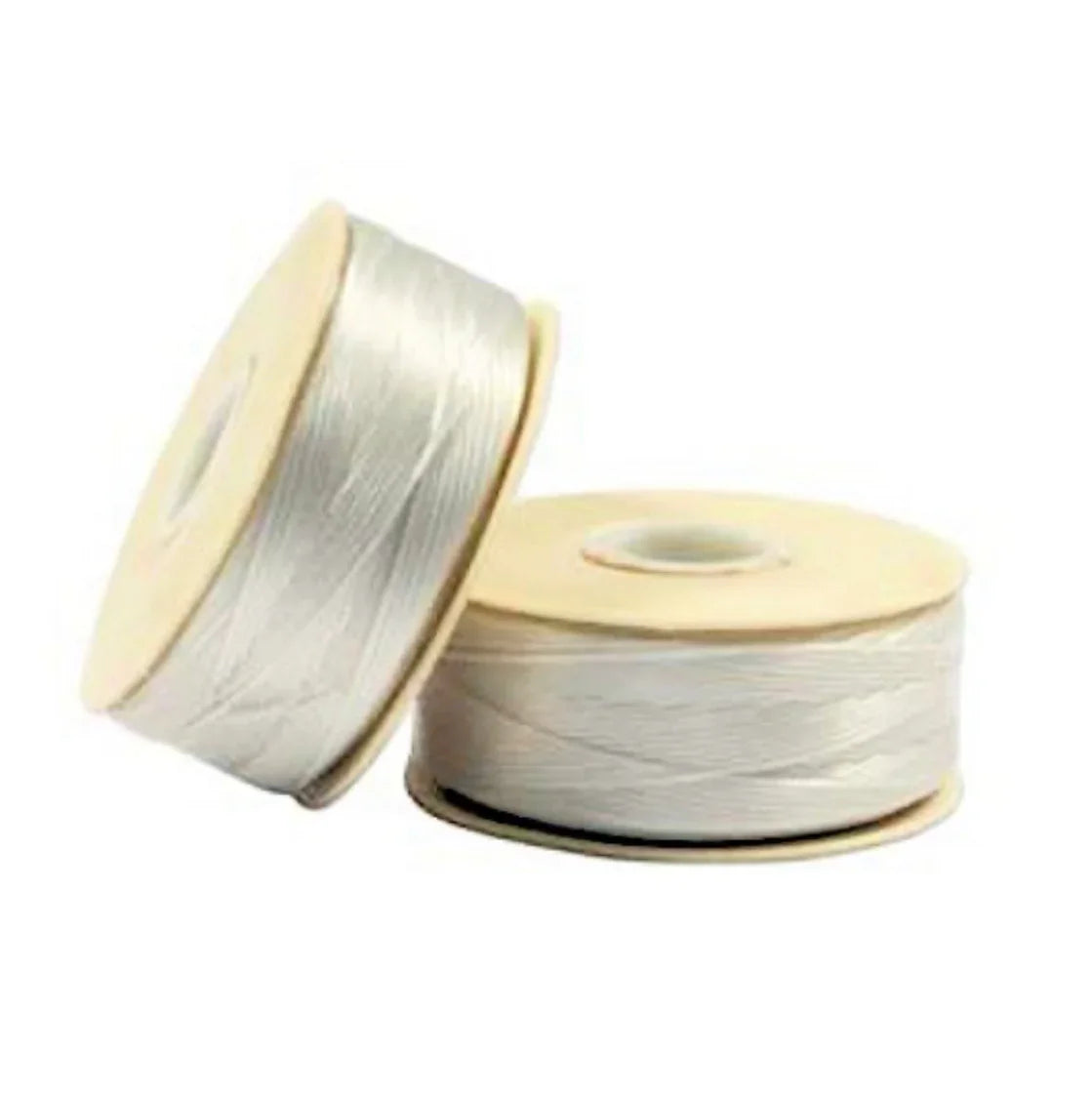 White satin ribbon spools for Native American crafts and traditional clothing projects