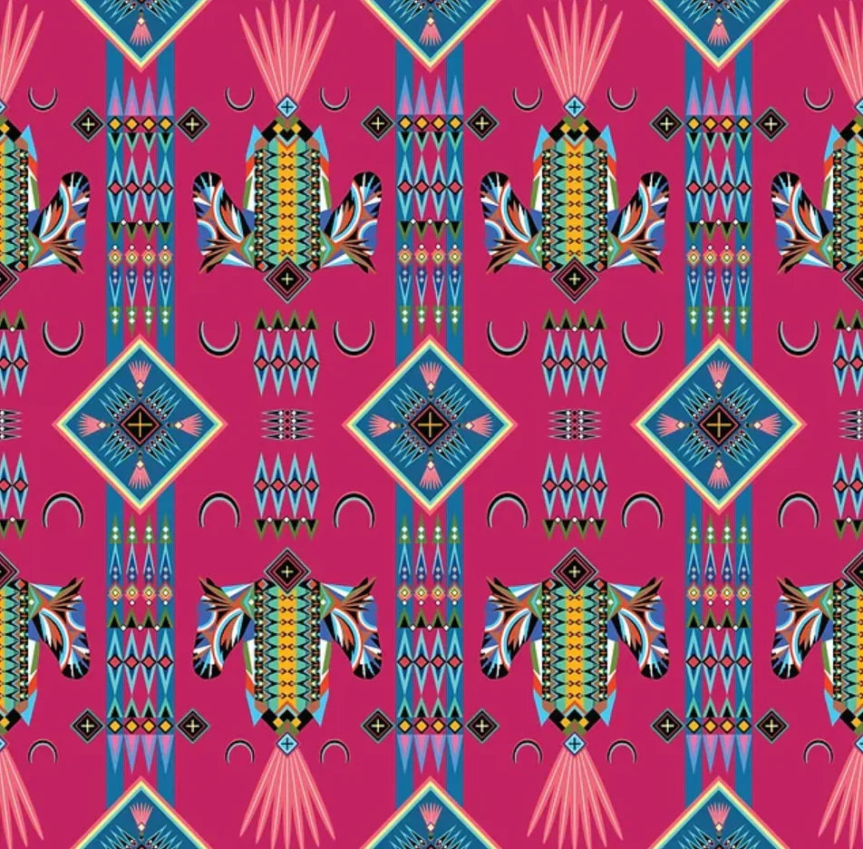 Vibrant Native American patterned fabric with geometric bird motifs, ideal for traditional clothing and crafts.
