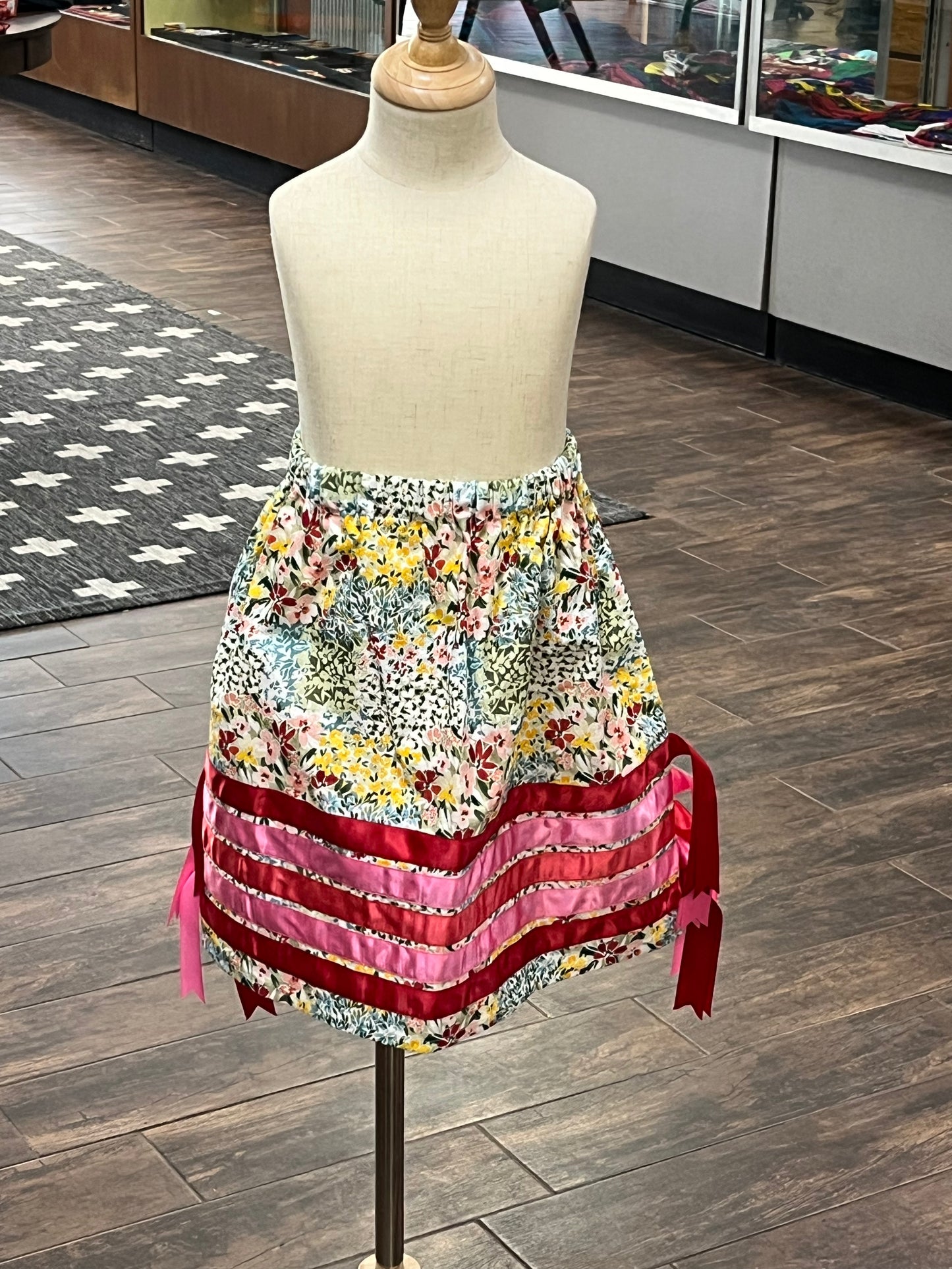 Girl’s Ribbon Skirt; Yellow Floral with Pink and Red Ribbons