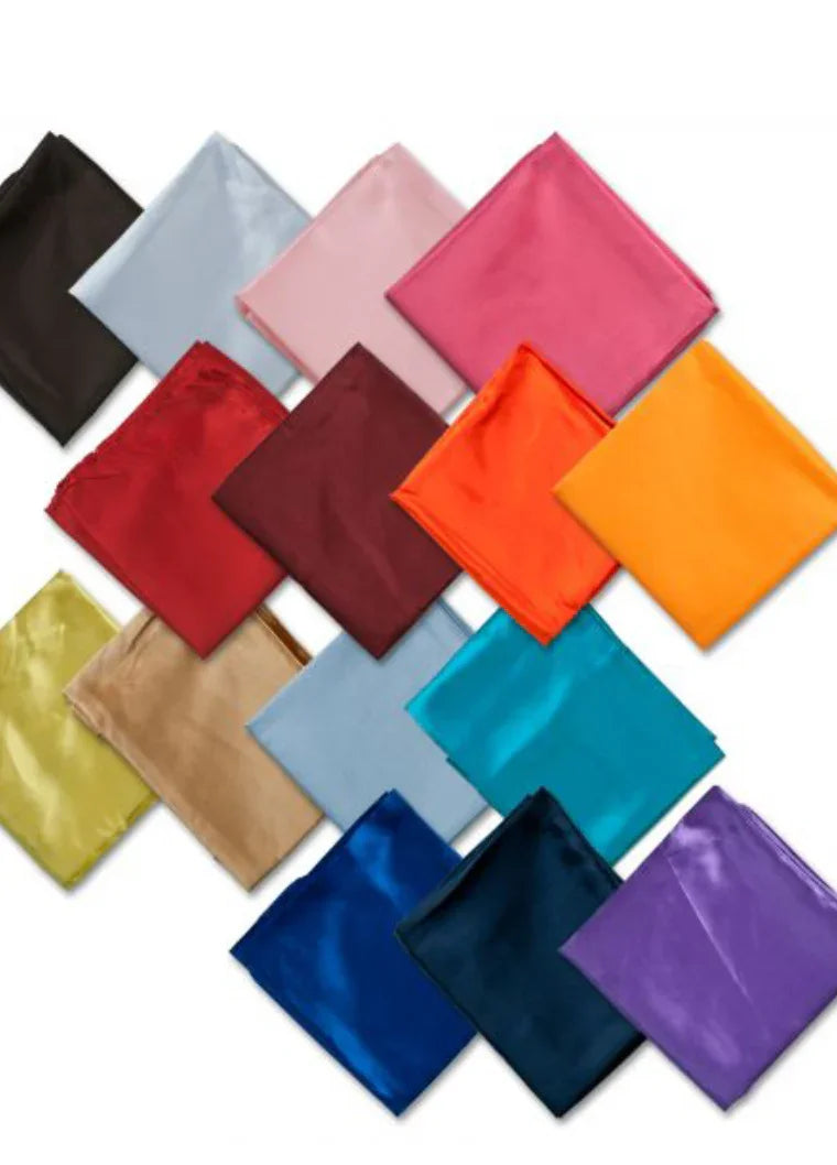 Vibrant satin fabric squares in assorted colors for Native American arts, crafts, and traditional clothing projects.