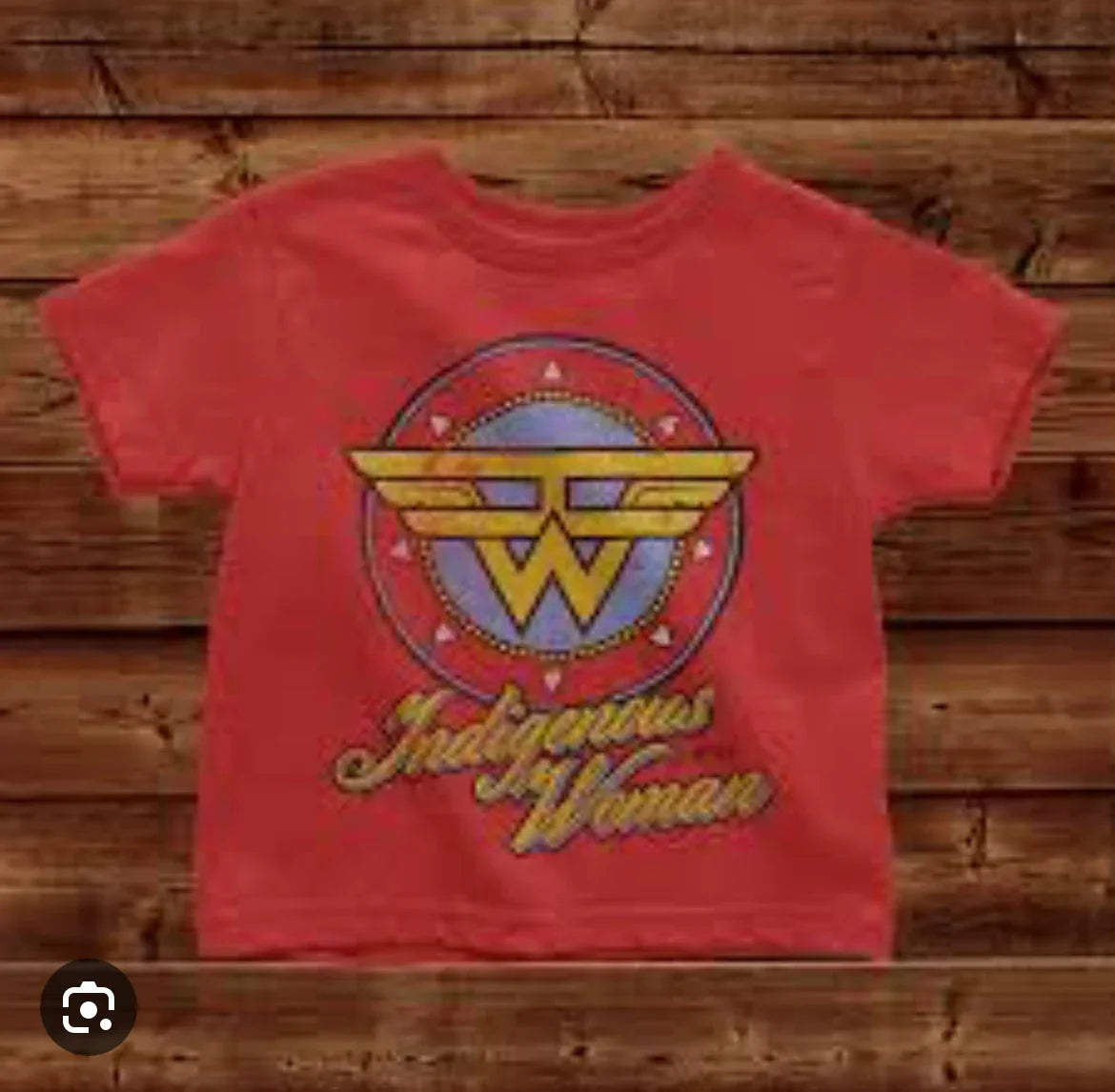 Red toddler tee with Indigenous Woman graphic, Native art design on wood background