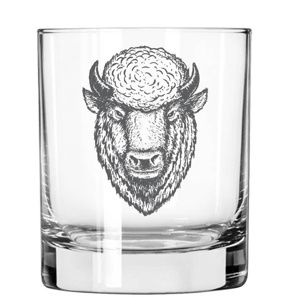 Clear glass tumbler with detailed bison head etching, perfect for Native art enthusiasts and craft supplies.
