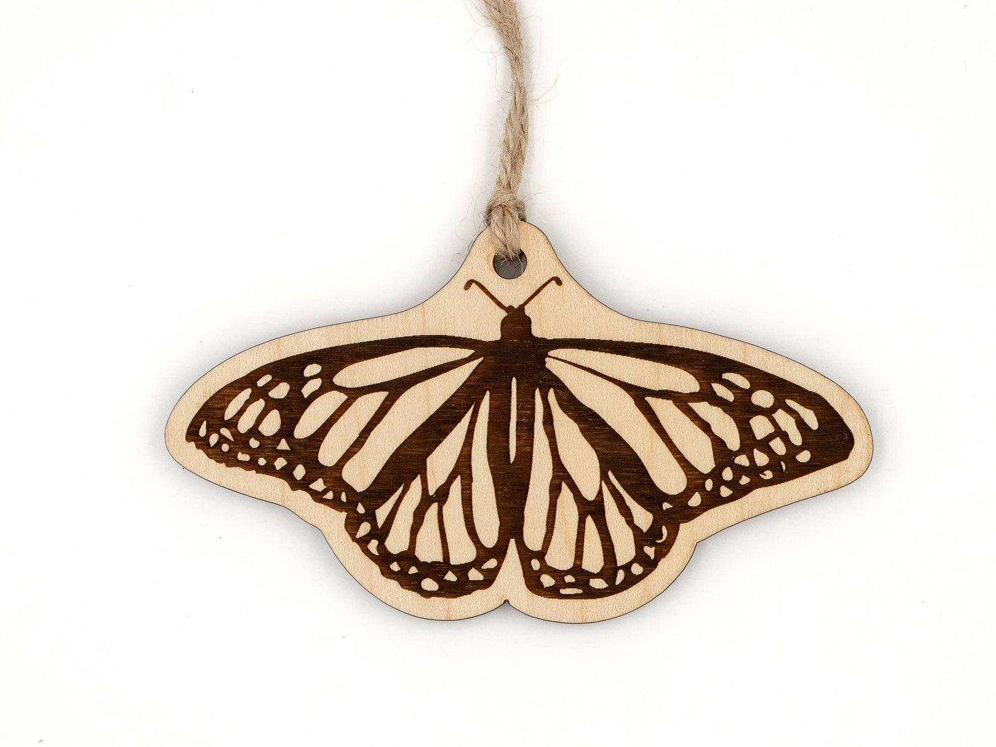 Laser-cut wooden butterfly ornament with twine hanger, ideal for Native art crafts and decor