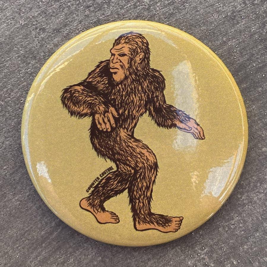 Bigfoot pin badge with 'Counter Couture' text, Native art inspired accessory