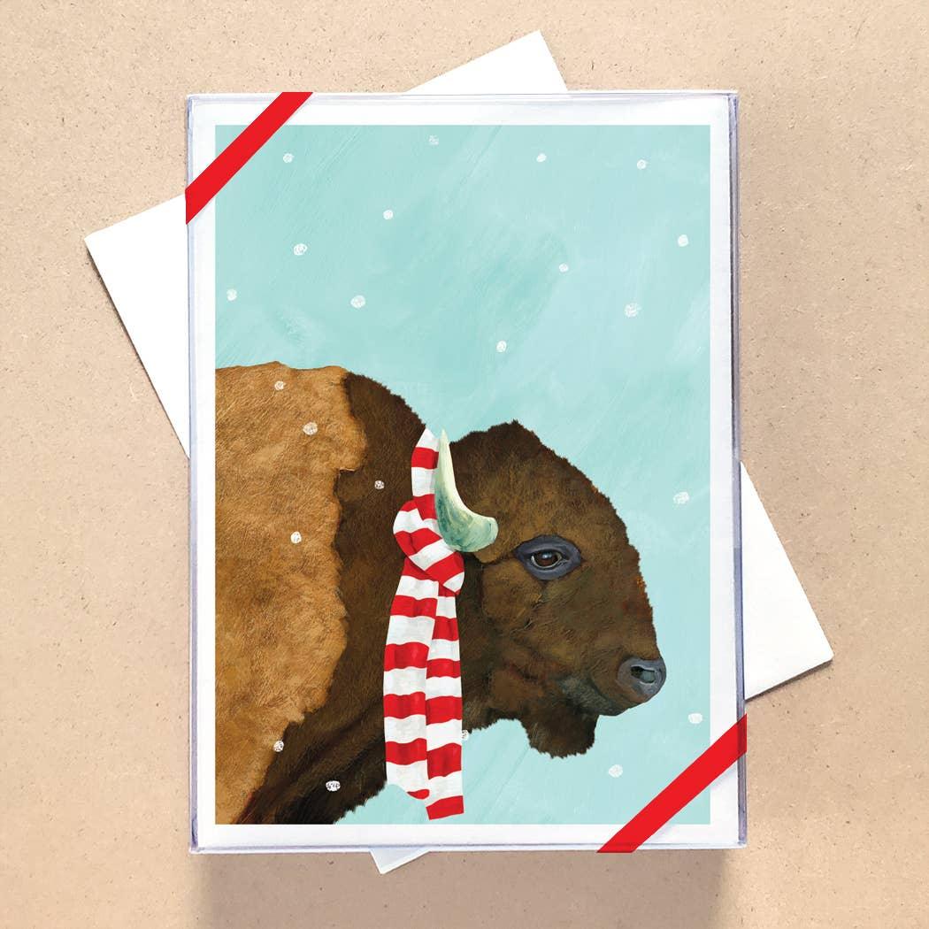 Bison wearing red and white striped scarf on snowy card, festive Native art inspired design