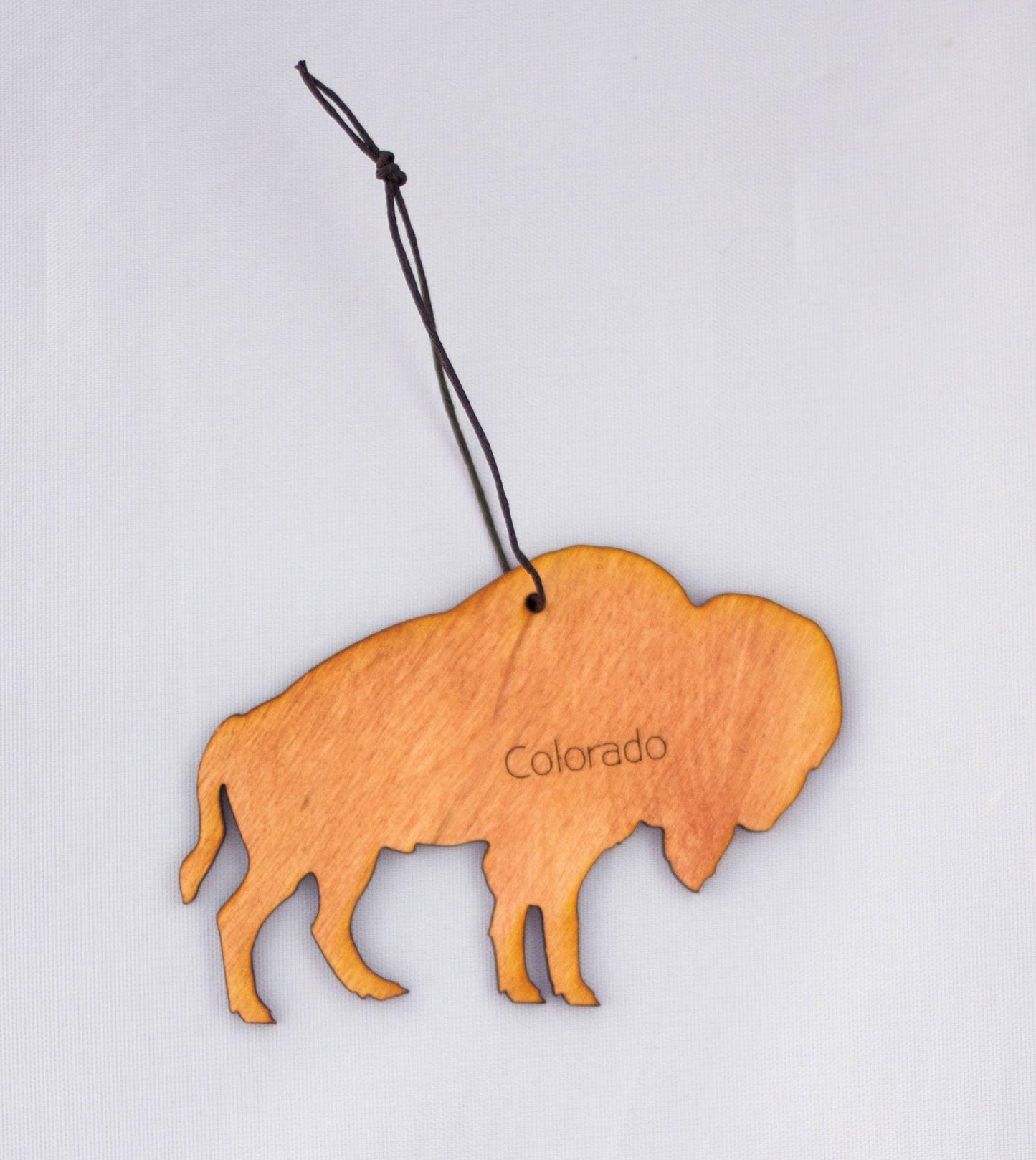 Wooden bison ornament engraved with Colorado, perfect for Native art decor and crafts