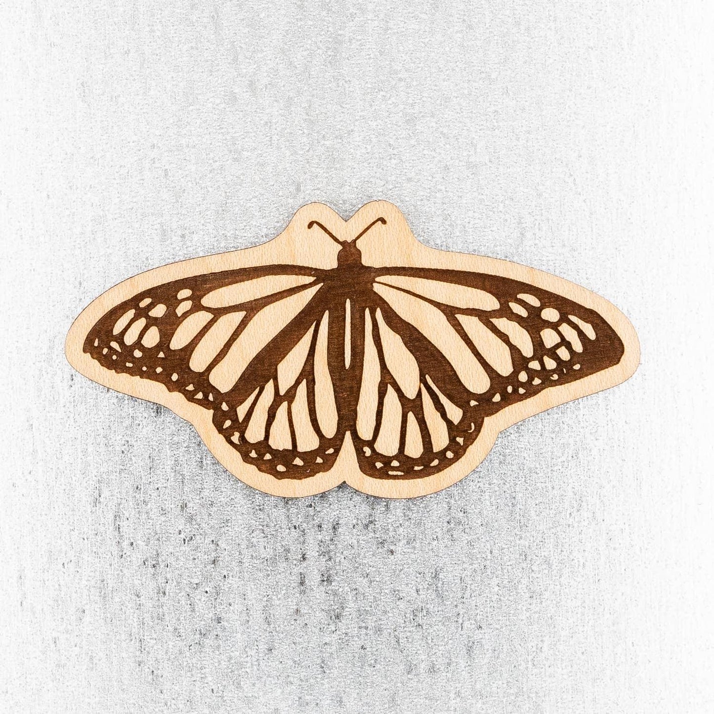 Laser-cut wooden monarch butterfly craft piece for Native art projects