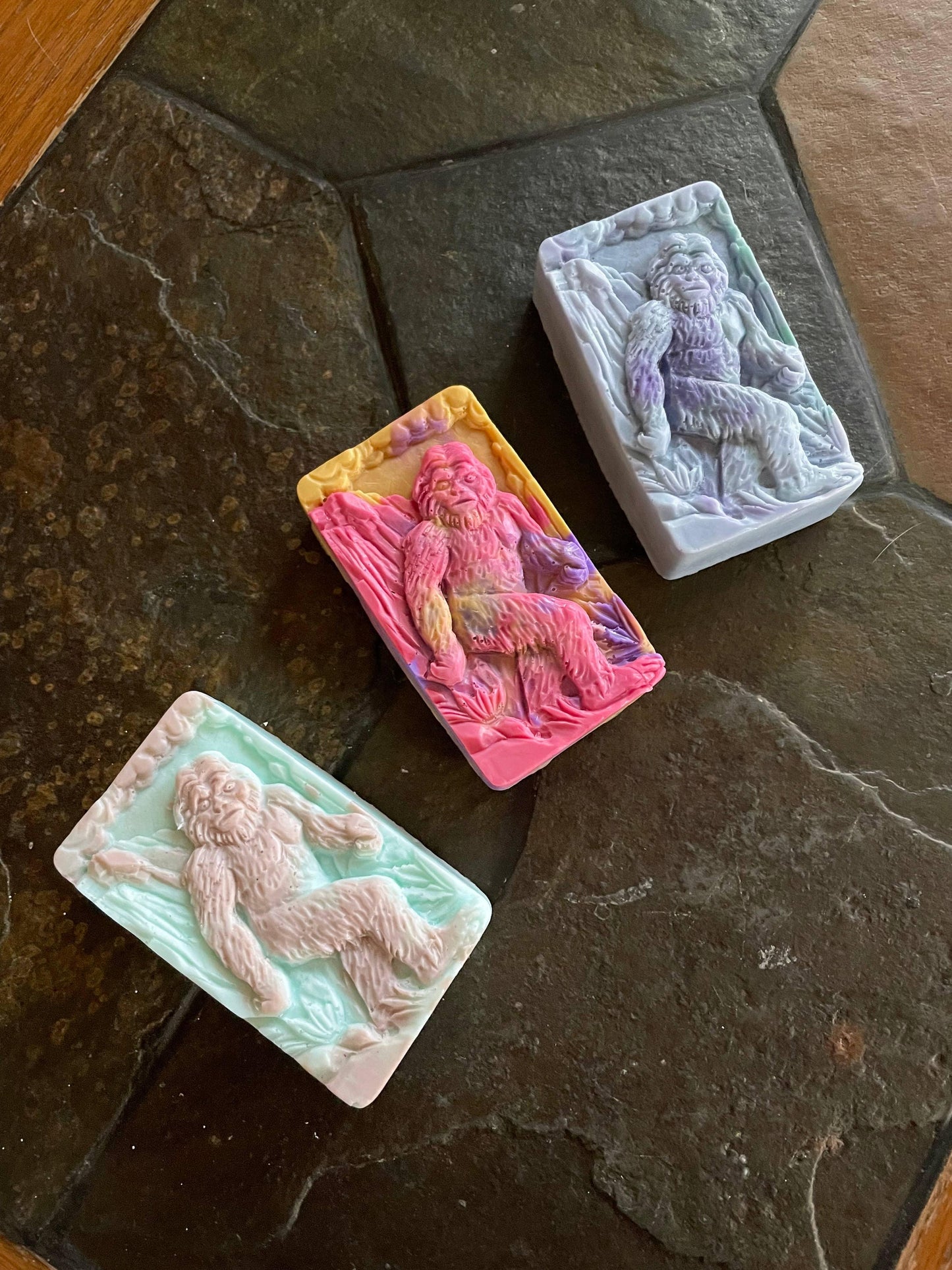 Three colorful Bigfoot soap bars with detailed creature design, perfect for Native art crafts and unique gifts.