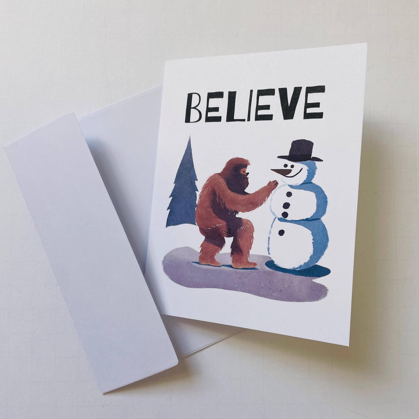 Bigfoot Building a Snowman Christmas Card : Brown Kraft Paper