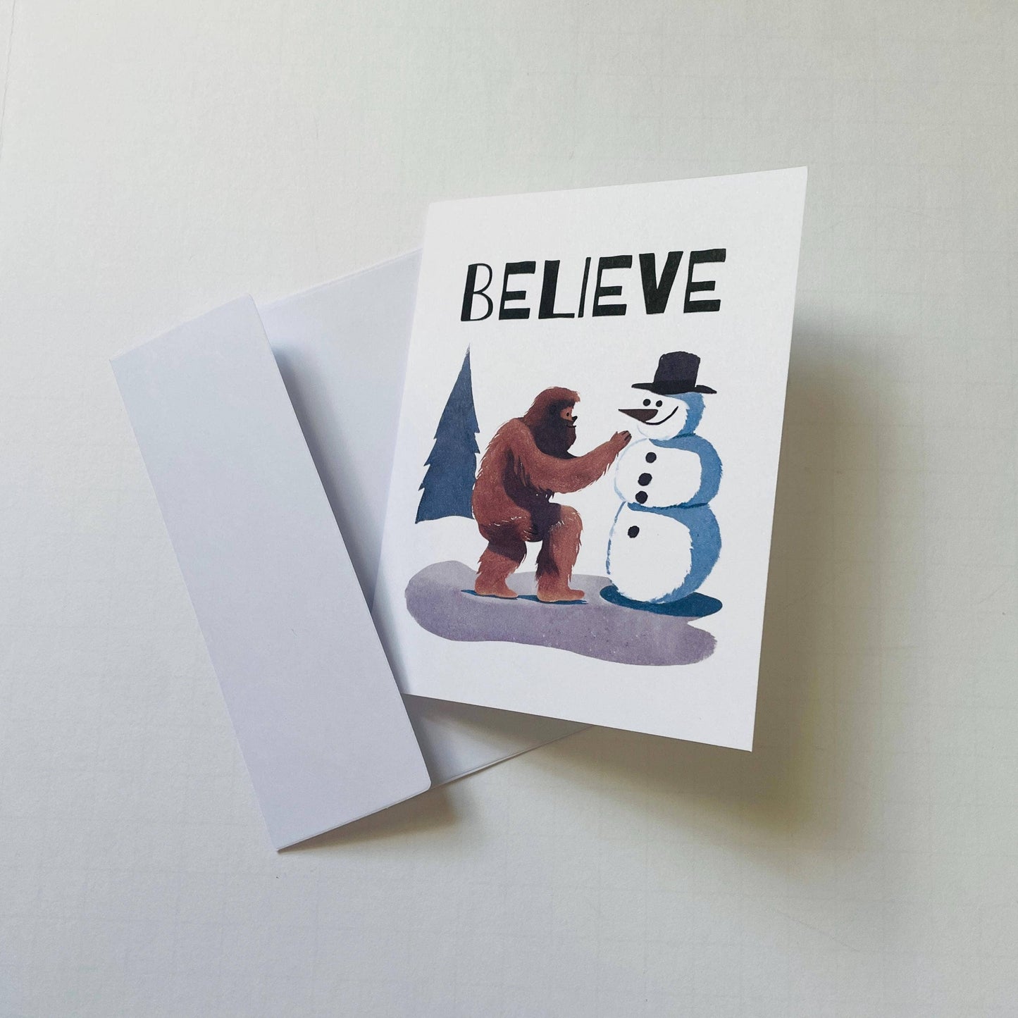 Bigfoot Building a Snowman Christmas Card : Brown Kraft Paper