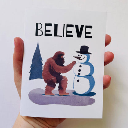 Bigfoot Building a Snowman Christmas Card : Brown Kraft Paper