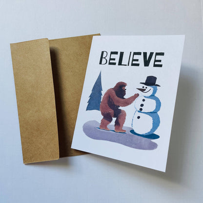 Bigfoot Building a Snowman Christmas Card : Brown Kraft Paper