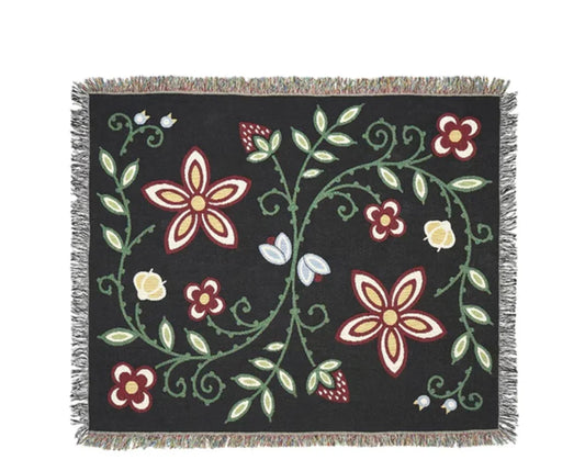 Black woven blanket with floral vine pattern, fringe edges, for Native art and home decor