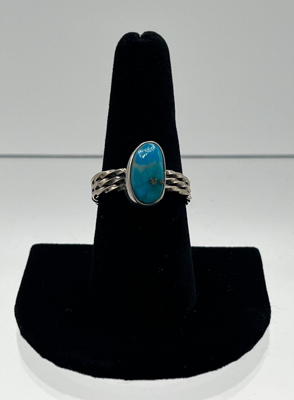 Blue Turquoise and Sterling Silver Oval Shaped Ring with Twist Design Band; Size 8.75