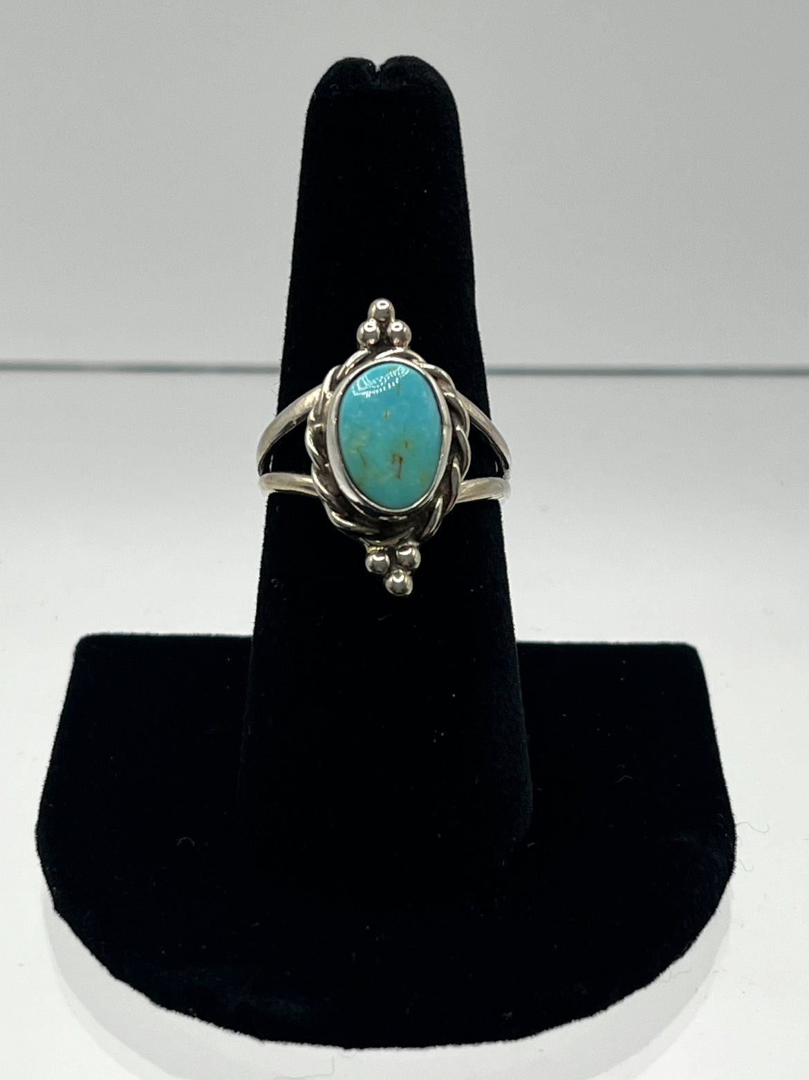 Turquoise and Sterling Silver Oval Shaped Ring with 3 Point Detail; Size 8.5