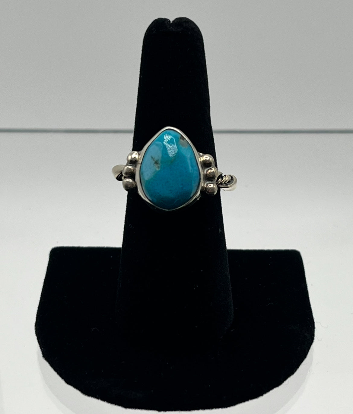 Turquoise and Sterling Silver Pear Shaped Ring with Rope Design Band; Size 7.75