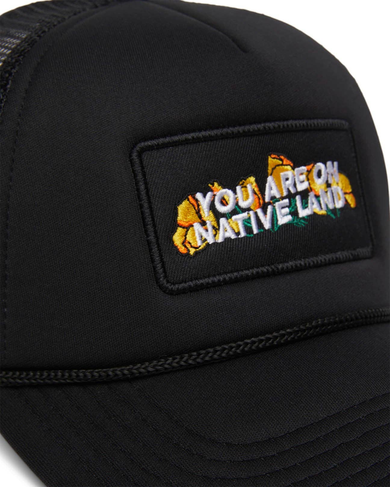 'YOU ARE ON NATIVE LAND' TRUCKER - BLACK POPPY