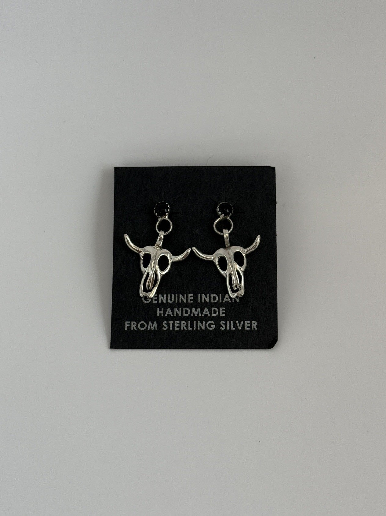 Sterling Silver Skull Earrings with Black Onyx