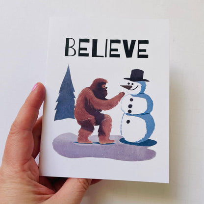 Bigfoot Building a Snowman Christmas Card : Brown Kraft Paper