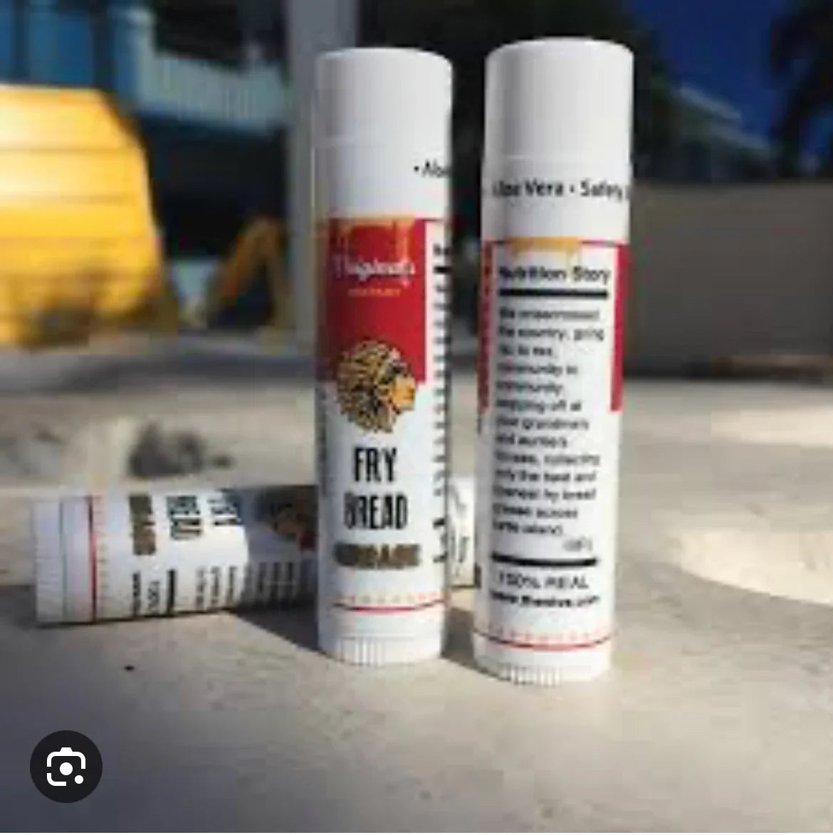 Fry Bread Lip Balm with Native art design, featuring Aloe Vera and natural ingredients for moisturizing care.